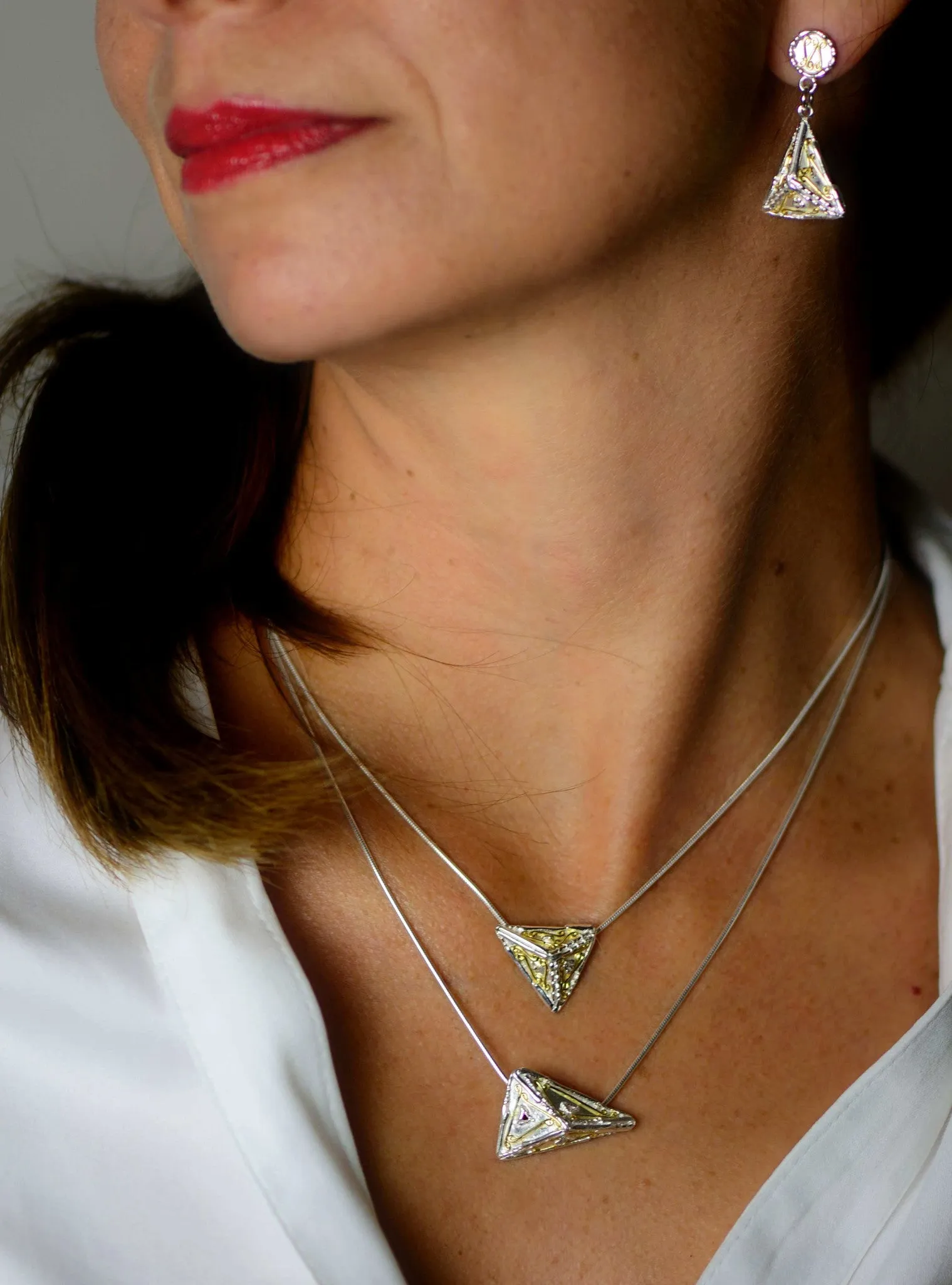18ct gold and silver patterned 3D triangle hanging earrings, geometrical designs